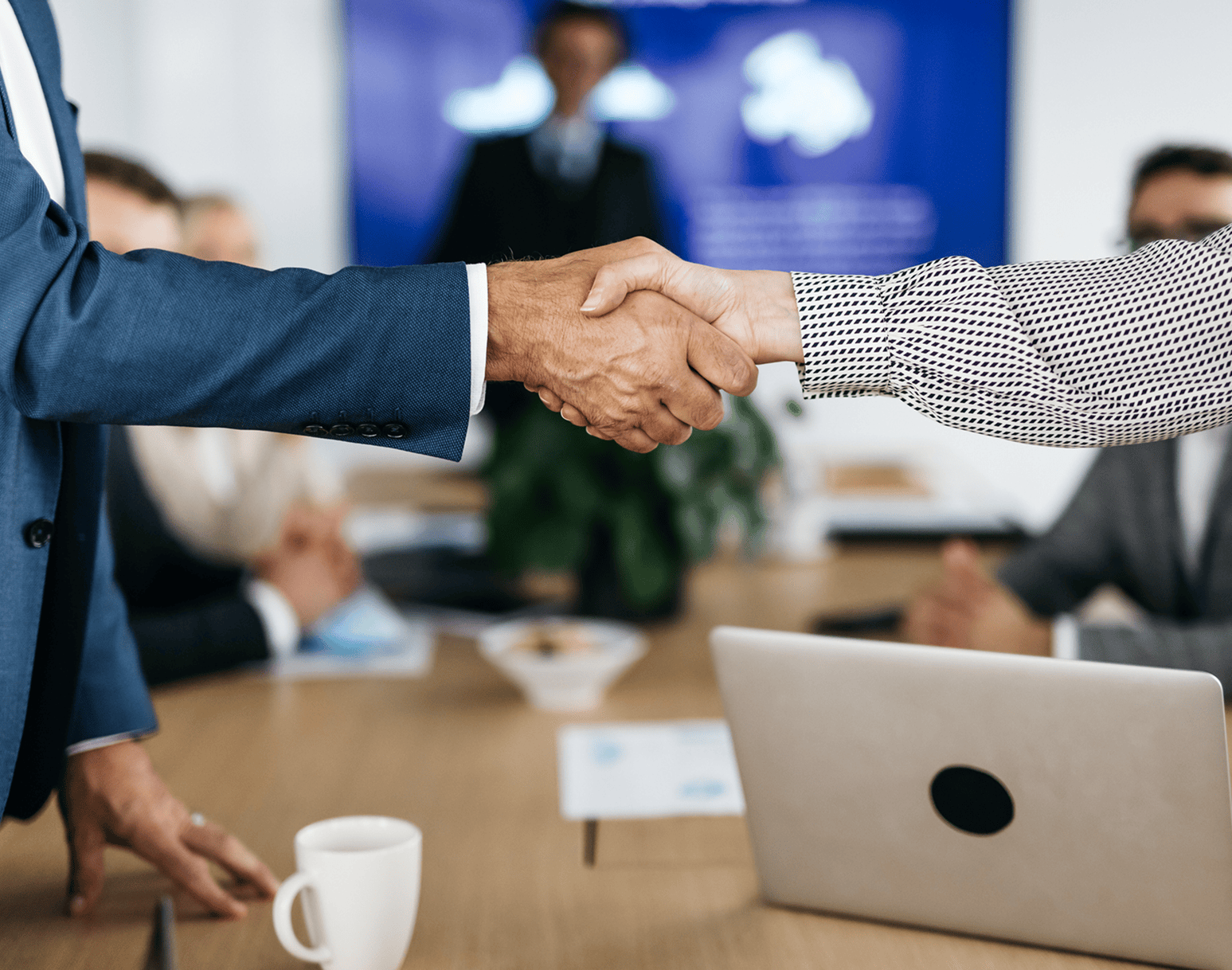 Professional agreement at conference table